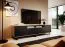 Meuble TV élégant avec Fonction push-to-open Zapopan 112, Dimensions : 56 x 180 x 40 cm, quatre compartiments, Couleur : Chêne Artisan / Noir, Pieds : Métal